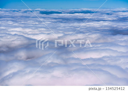 Scenic fluffy cloudscape soft texture, atmospheric pattern view Scenic fluffy cloudscape soft texture, atmospheric pattern view 134525412