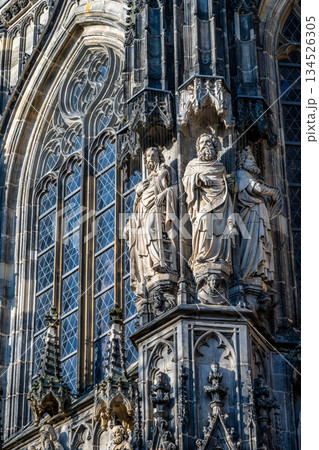 Aachen Cathedral Gothic window tracery and apostle statues close up Aachen Cathedral Gothic window tracery and apostle statues close up 134526305