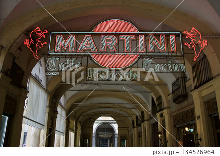Turin, Italy, September 14, 2019: Vintage Martini Neon Sign on Arcade in City Center 134526964