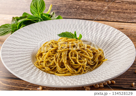 Italian green pasta with pesto sauce Italian green pasta with pesto sauce 134528129