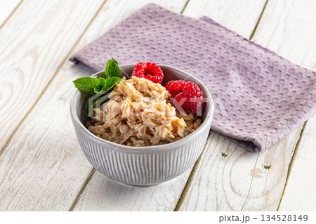 Oat porridge with raspberry Oat porridge with raspberry 134528149