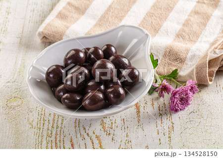 Nut in chocolate balls sweet candy 134528150