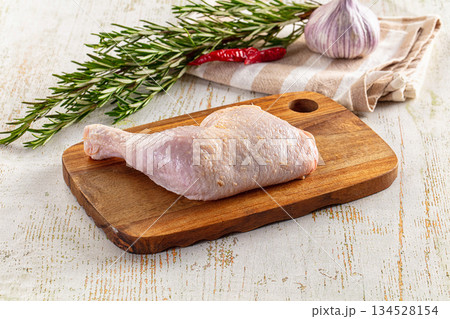 Raw whole chicken leg for cooking 134528154