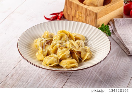 Tasty Russian dumplings with meat Tasty Russian dumplings with meat 134528195