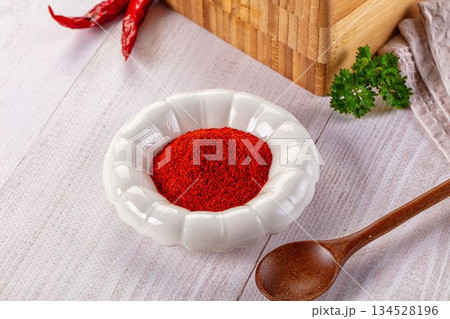 Red dry chili pepper paprika powder Red dry chili pepper paprika powder 134528196