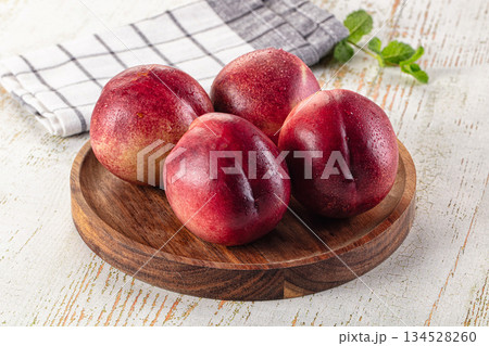 Ripe sweet juicy nectarines heap Ripe sweet juicy nectarines heap 134528260