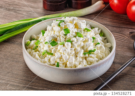 Cottage cheese with green onion Cottage cheese with green onion 134528271