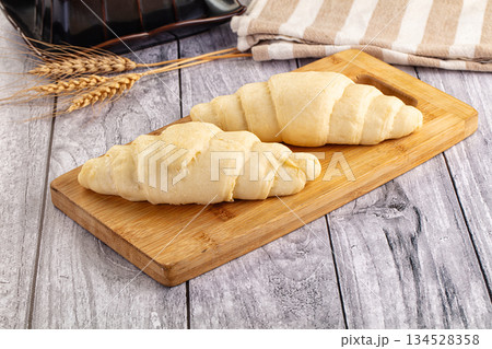 Raw uncooked croissant for bake 134528358