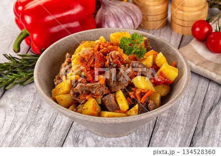 Rogiut with meat, potato and tomatoes 134528360
