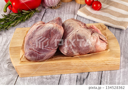 Uncooked raw fresh pork heart Uncooked raw fresh pork heart 134528362