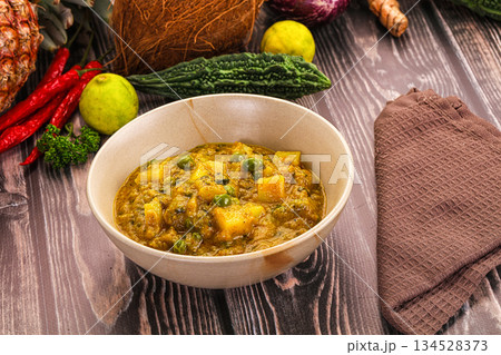 Aloo masala with green peas Aloo masala with green peas 134528373