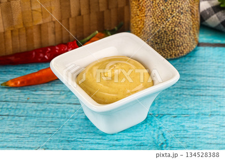 Spicy yellow mustard sauce dip 134528388