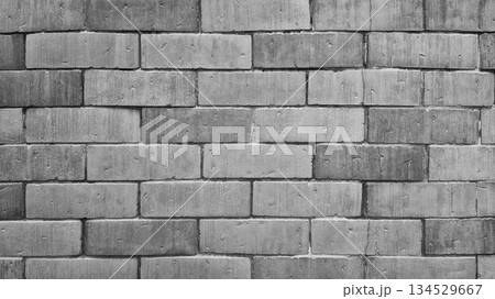 Black and white curved brick wall texture, monochrome architectural masonry background. 134529667