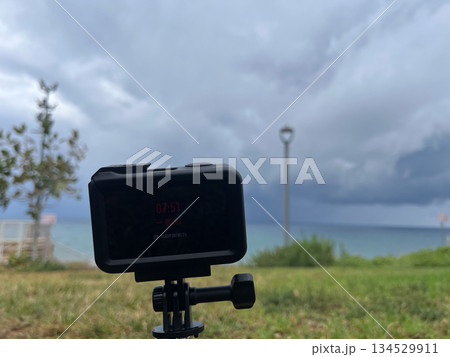 Capturing nature with an action camera mounted on a selfie stick, High quality photo Capturing nature with an action camera mounted on a selfie stick, High quality photo 134529911