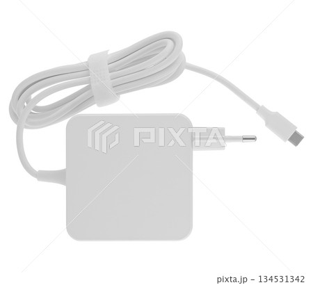Laptop power adapter, computer spare part, on white background in insulation Laptop power adapter, computer spare part, on white background in insulation 134531342