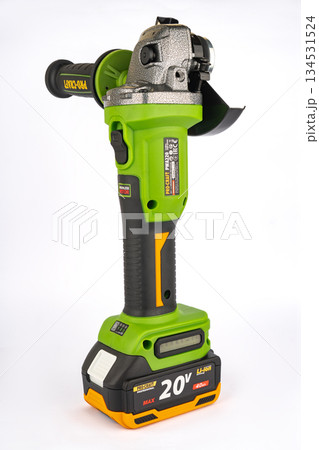 ProCraft cordless angle grinder on white background in insulation. ProCraft cordless angle grinder on white background in insulation. 134531524
