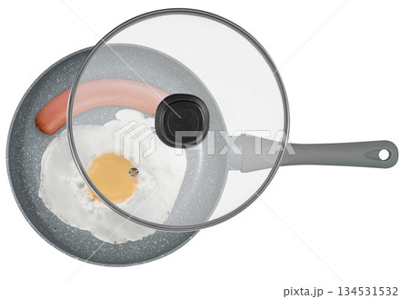 scrambled eggs and sausage on a frying pan, on a white background in isolation scrambled eggs and sausage on a frying pan, on a white background in isolation 134531532
