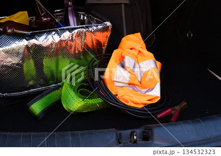 Packing car trunk with safety equipment for travel 134532323