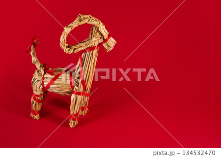 Julbock Straw Goat on Red Background Julbock Straw Goat on Red Background 134532470