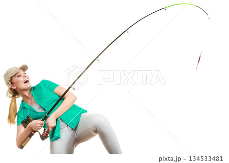 Woman with fishing rod, spinning equipment 134533481
