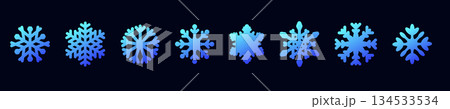 Elegant blue snowflake designs on dark background Elegant blue snowflake designs on dark background 134533534