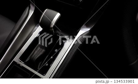 Car gear. Close up of modern car automatic gear selector or electronic shifter. Premium interior design EV car gears driving control. auto transmission modes. Automotive technology in motion driving. 134533901