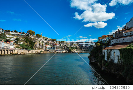 Scenic view of Douro River and historic cityscape of Porto, Portugal Scenic view of Douro River and historic cityscape of Porto, Portugal 134535930