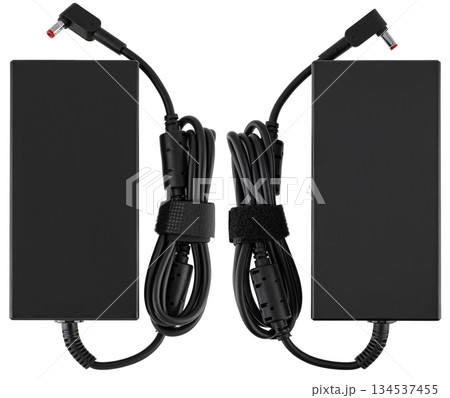 Power adapter for laptop, on white background in insulation Power adapter for laptop, on white background in insulation 134537455