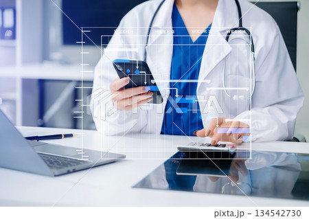 Project manager working and update tasks with Gantt chart scheduling diagram at hospital .success smart medical doctor working Project manager working and update tasks with Gantt chart scheduling diagram at hospital .success smart medical doctor working 134542730