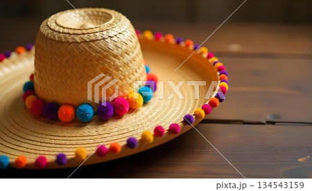 A lively sombrero atop a wooden table, highlighting Latino culture and community spirit during Hispanic Heritage Month 134543159