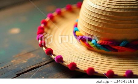 A bright sombrero placed on a wooden table, celebrating Hispanic Heritage Month and the richness of Latino culture 134543161