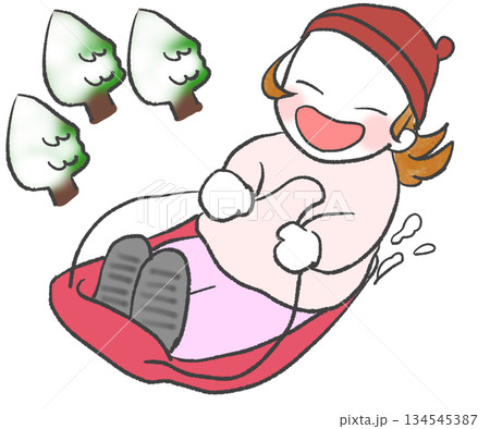 ソリで坂を滑り下りる女の子 ソリで坂を滑り下りる女の子 134545387