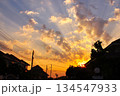 silhouette of a roof and sunset 134547933