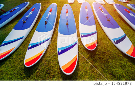 A lot of surfboards on the beach. Summer background. 134551978