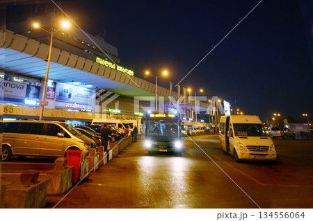 AILWAY station in night and traffic of car and bus . Cars in Parking lots.5 days before Christmas AILWAY station in night and traffic of car and bus . Cars in Parking lots.5 days before Christmas 134556064