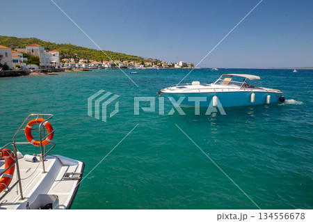 Boat with unrecogniable persaon on Crete or Santorini or corfu or Spetstes 134556678