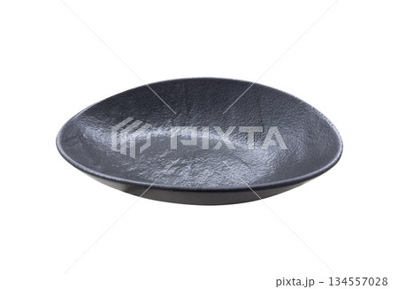 Empty black ceramic plate isolated on a white background.Black dish isolated. 134557028