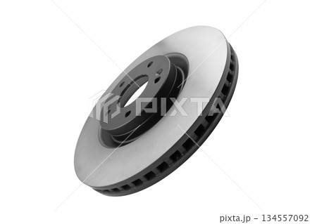 Car brake disc isolated on white background. Auto spare parts. Perforated brake disc rotor isolated on white. Braking ventilated discs. Quality spare parts for car service or maintenance 134557092