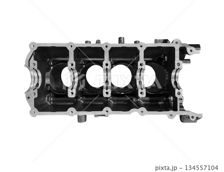 Cylinder block engine isolated on a white background. Block car engine cylinder on a white background. Car parts, top view. 134557104