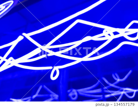 Blurred defocused bokeh background of exhibition hall or convention centre hallway. Business trade show modern white interior architecture. Abstract blur modern business office background Blurred defocused bokeh background of exhibition hall or convention centre hallway. Business trade show modern white interior architecture. Abstract blur modern business office background 134557179