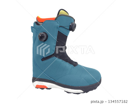 Snowboard boots isolated on white background. Modern sport equipment isolated. Snowboard boots isolated on white background. Modern sport equipment isolated. 134557182