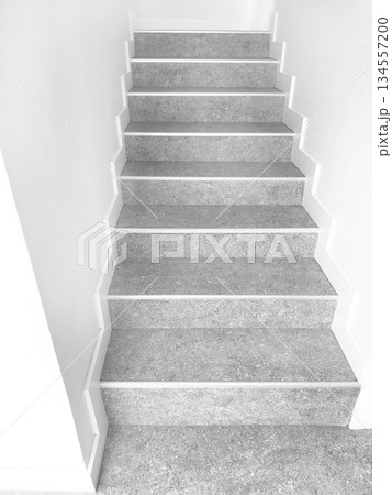 Modern stairs in loft interior. Interior with stairs. Straight staircase with railings 134557200