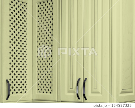 Modern kitchen interior. Handles on kitchen cabinets. Salon with kitchen. Modern kitchen set. 134557323