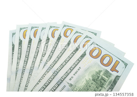 Stack of one hundred dollar bills. Stack of cash money in hundred dollar banknotes. Heap of hundred dollar bills on white background Stack of one hundred dollar bills. Stack of cash money in hundred dollar banknotes. Heap of hundred dollar bills on white background 134557358