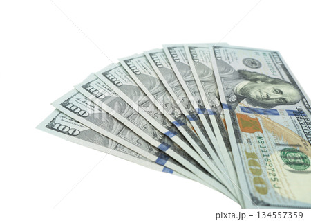 Stack of one hundred dollar bills. Stack of cash money in hundred dollar banknotes. Heap of hundred dollar bills on white background Stack of one hundred dollar bills. Stack of cash money in hundred dollar banknotes. Heap of hundred dollar bills on white background 134557359