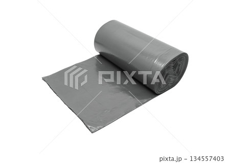 Grey recycle rolls of garbage bin bags isolated on white background with copy space. Roll of garbage bags close-up Grey recycle rolls of garbage bin bags isolated on white background with copy space. Roll of garbage bags close-up 134557403