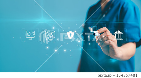 Healthcare professional interacting with digital security icons representing data protection, secure communication, patient privacy, medical information safety in modern healthcare technology systems. 134557481