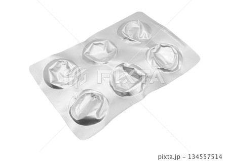 Empty pills of blister pack isolated on white background. Empty silver blister. Used blister pill. Empty blister pack from drugs. 134557514