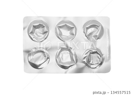 Empty pills of blister pack isolated on white background. Empty silver blister. Used blister pill. Empty blister pack from drugs. Empty pills of blister pack isolated on white background. Empty silver blister. Used blister pill. Empty blister pack from drugs. 134557515