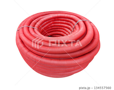 HDPE corrugated pipe isolated on white background. Protection underground cable. Rolled up red corrugated PVC pipe. Red building pipes. Coated corrugated construction pipe. 134557560